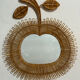 Rattan mirror in the shape of an apple from the 1960s Italy.