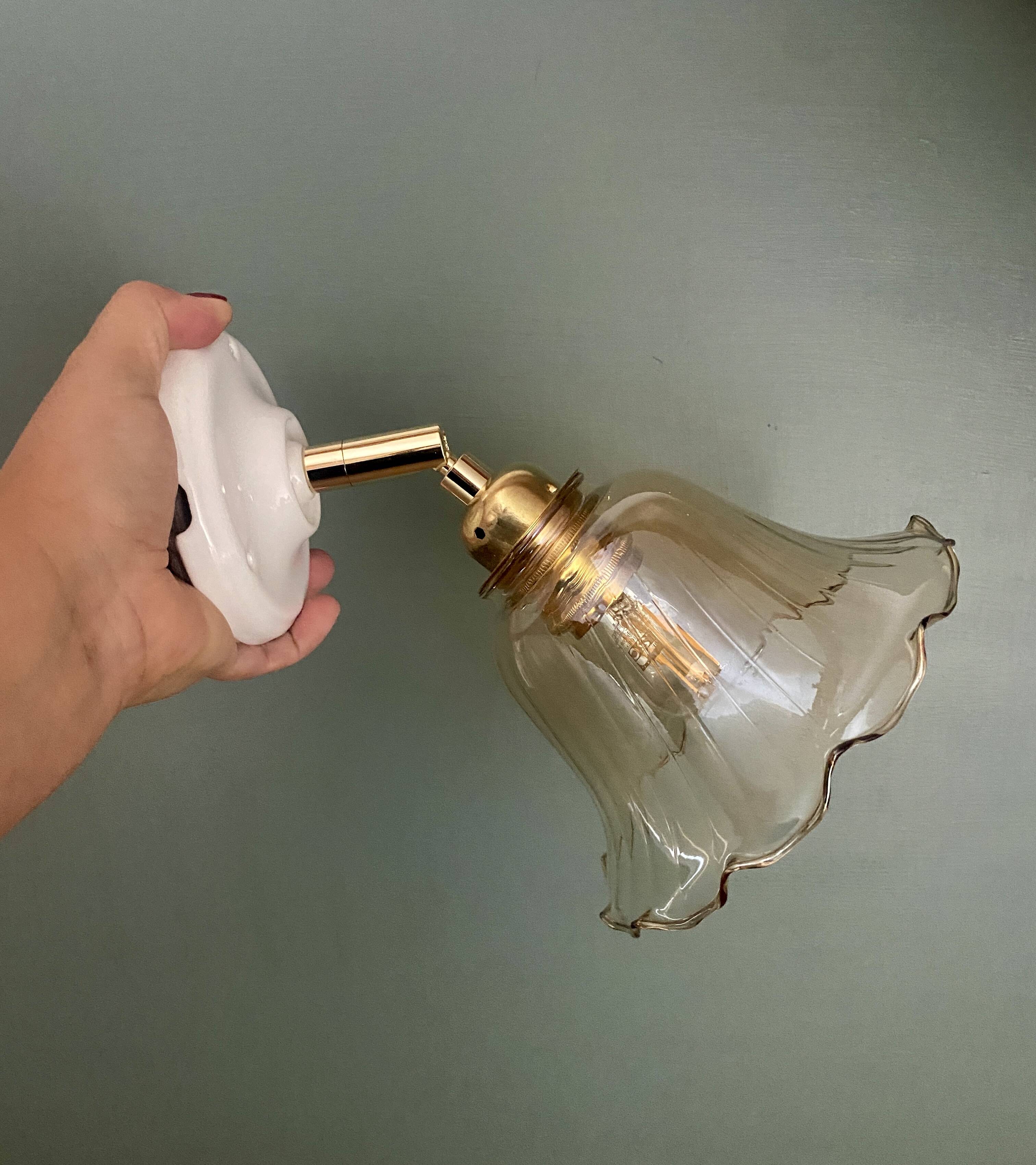 Vintage tulip wall light in amber glass