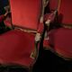 Pair of flat-back armchairs in Louis XV style in red velvet.