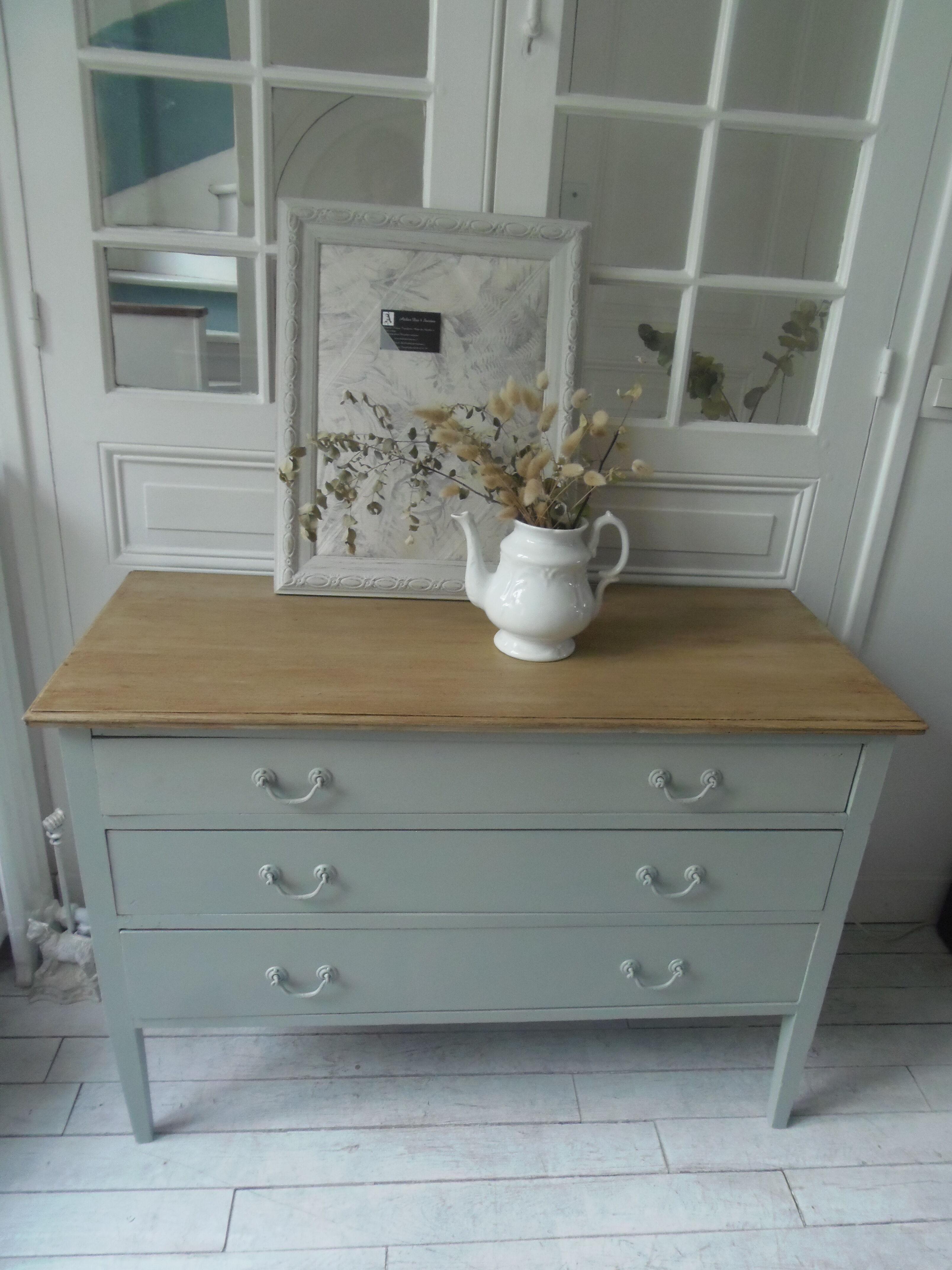 Green green vintage chest of drawers of gray, wood top.