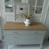 Green green vintage chest of drawers of gray, wood top.