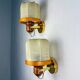 Pair of Italian articulated "Cocoon" wall lights, resin and pine, 1970s