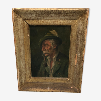 Portrat painting old man smoking a pipe