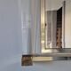 Miroir Pierre Vandel en lucite et doré, années 70