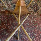 Vintage Mexican tripod stools in bamboo and leather.