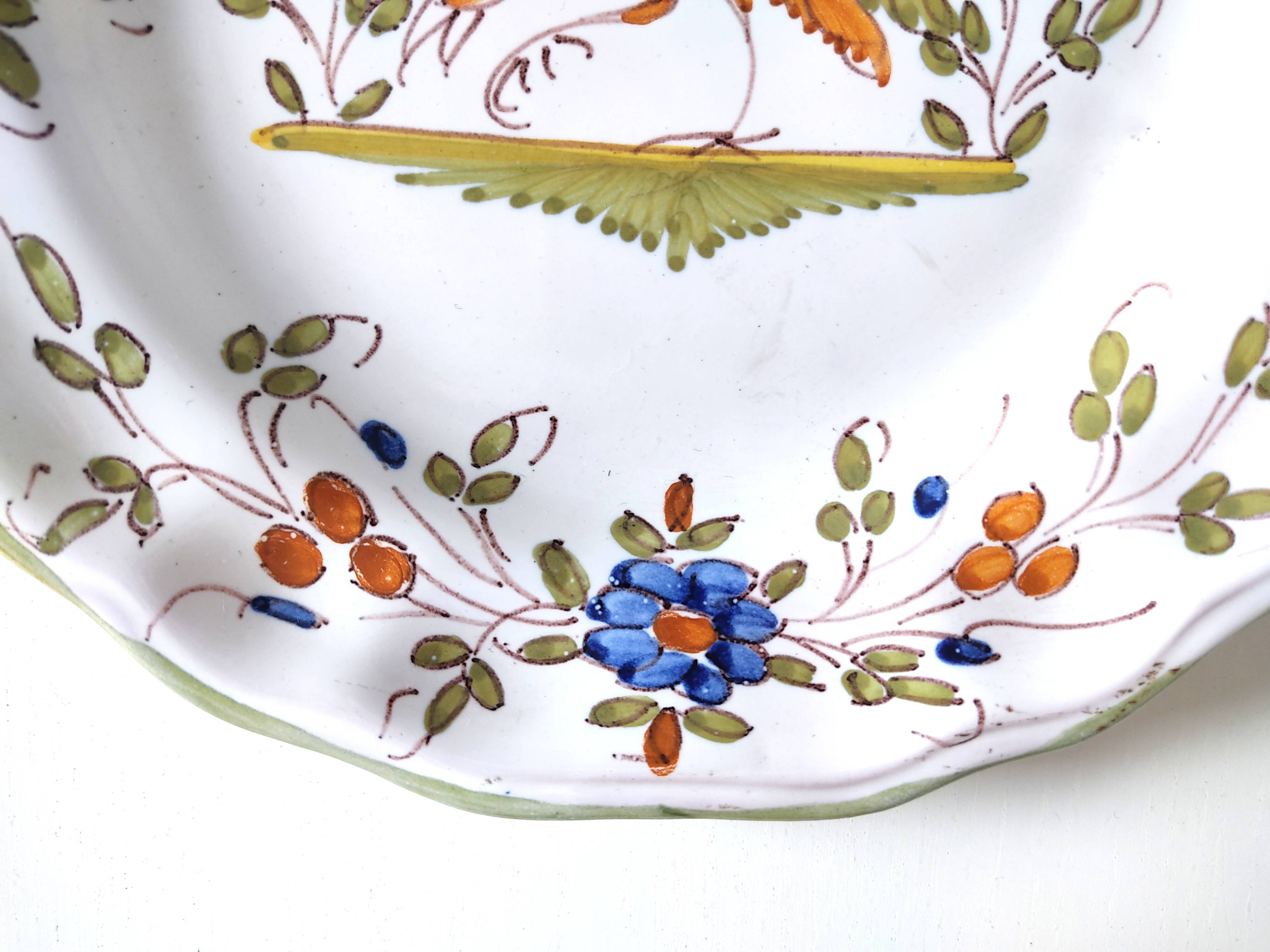 Moustiers earthenware decorative plate with bird
