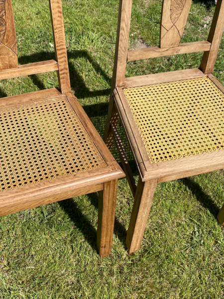 Black chairs and cannage