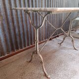 Marble bistro table with cast iron base