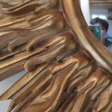 Sun mirror and witch's eye in gilded wood