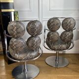 Pair of italian swivel armchairs in chrome-plated metal and piton imitation fabrics