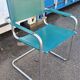 Fauteuil cantilever en métal chromé et cuir vert