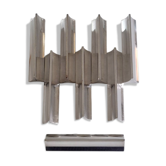 Eight Boulenger knife holders in art deco silver metal