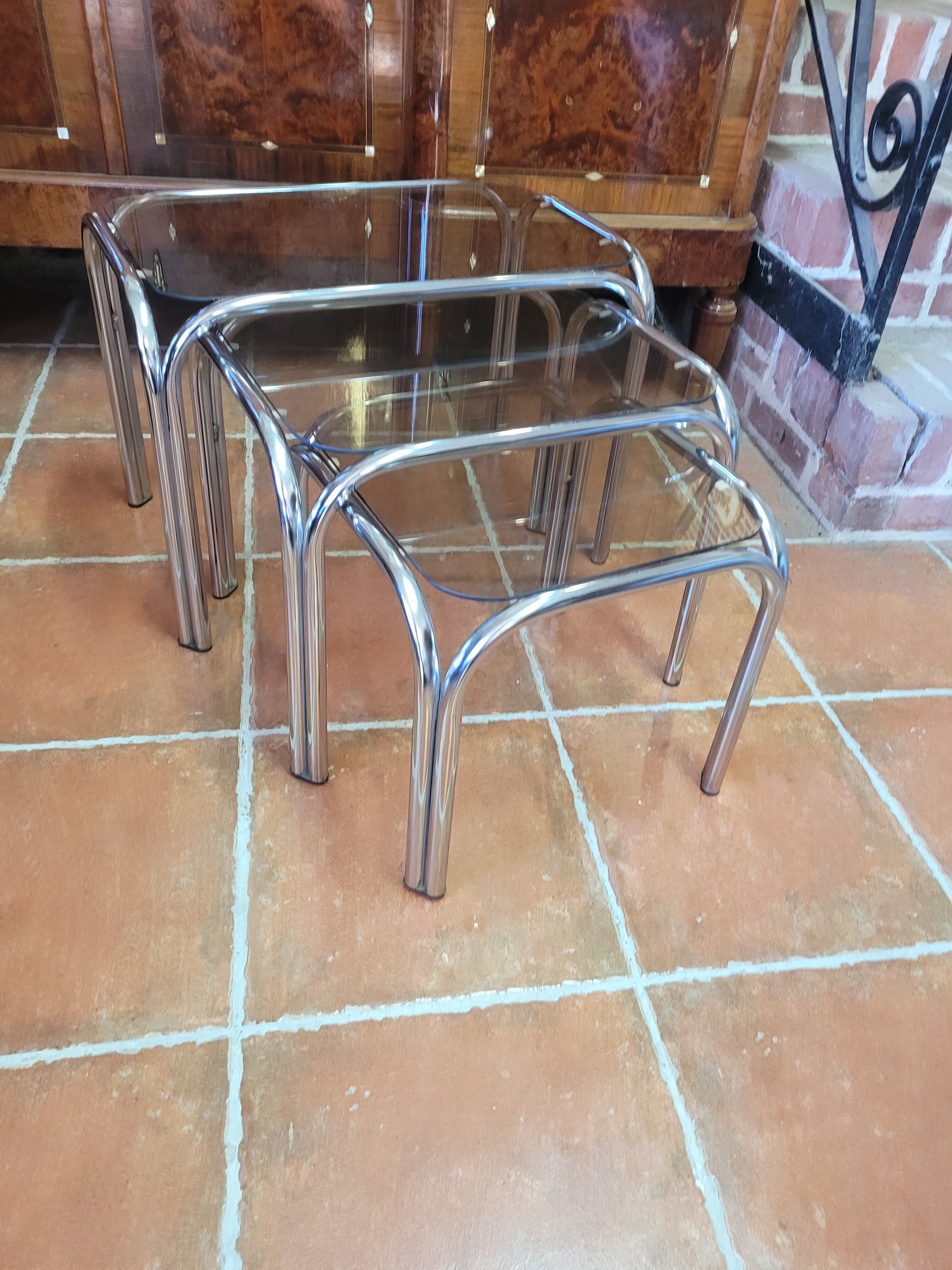 Chrome nesting table with smoked glass top from the 70s