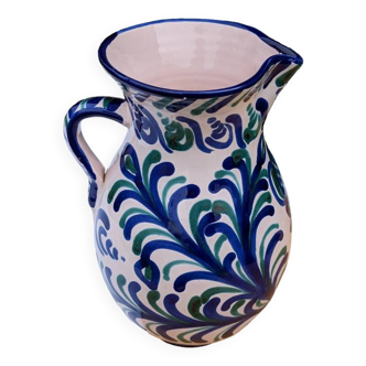 Large ceramic pitcher with blue green patterns