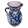 Large ceramic pitcher with blue green patterns