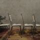 Suite de 4 chaises vintage en skaï