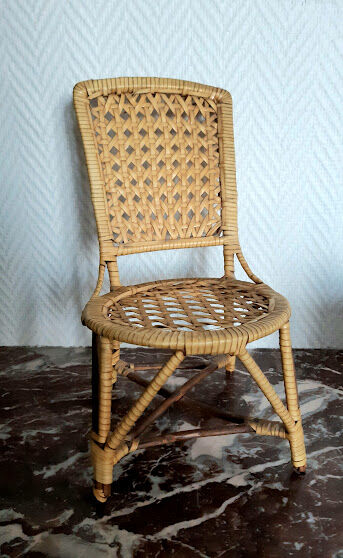 Vintage rattan doll chair