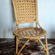 Vintage rattan doll chair