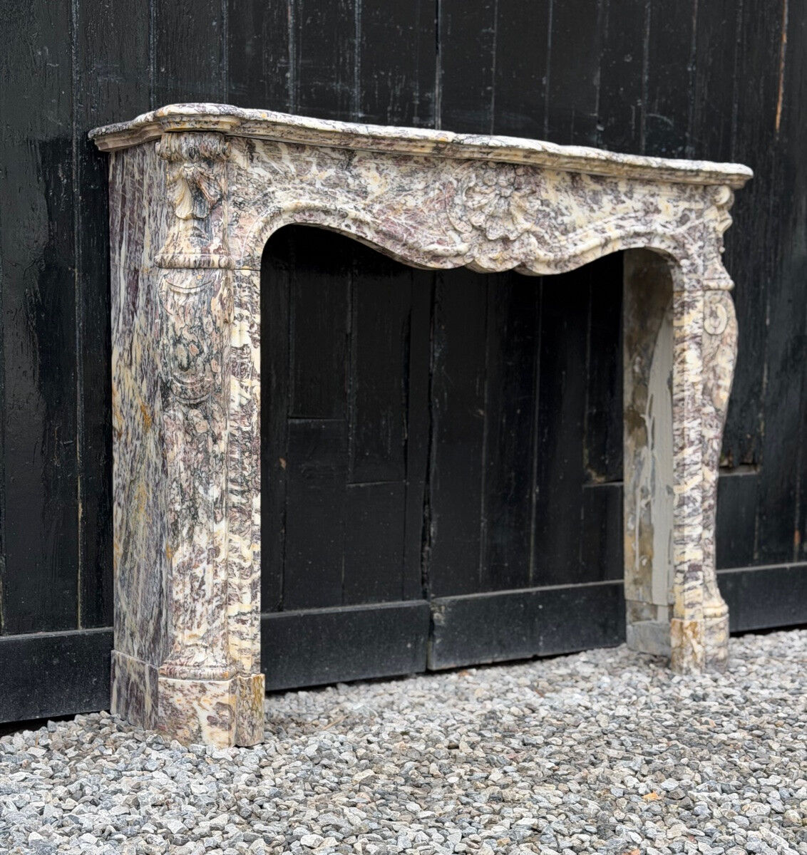 Louis XV style fireplace in Brocatelle marble, circa 1880.