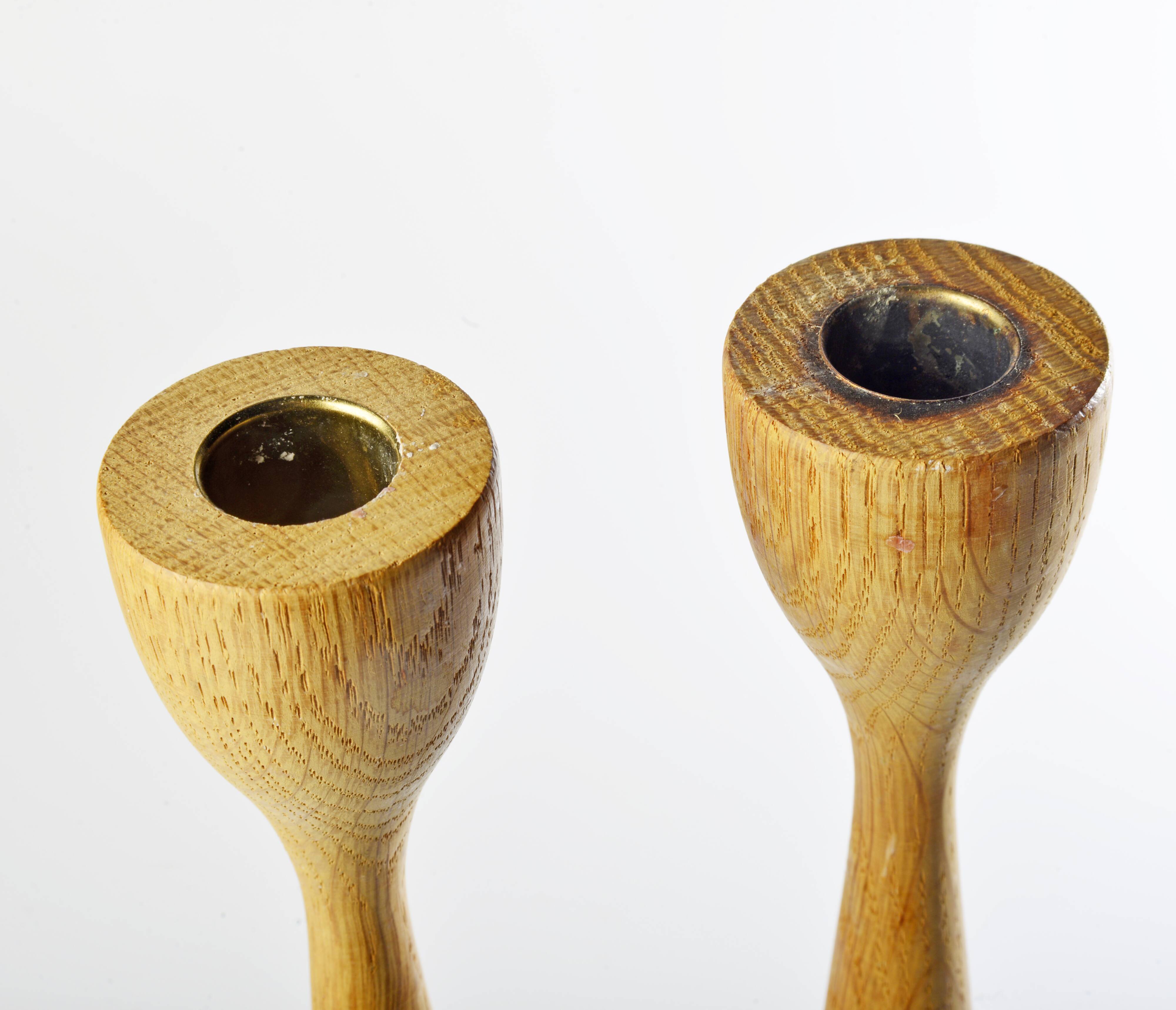 Pair of teak candle holders