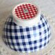 Large vintage white earthenware bowl with blue gingham pattern