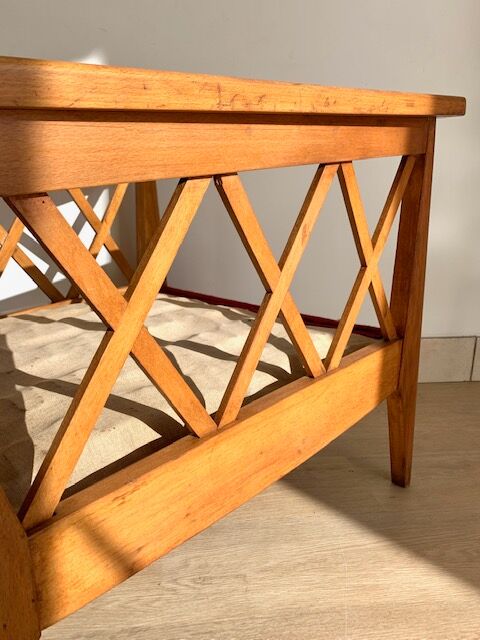 Pair of vintage wooden armchairs with braces