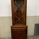 Meuble Vitrine d’encoignure en merisier XX e s