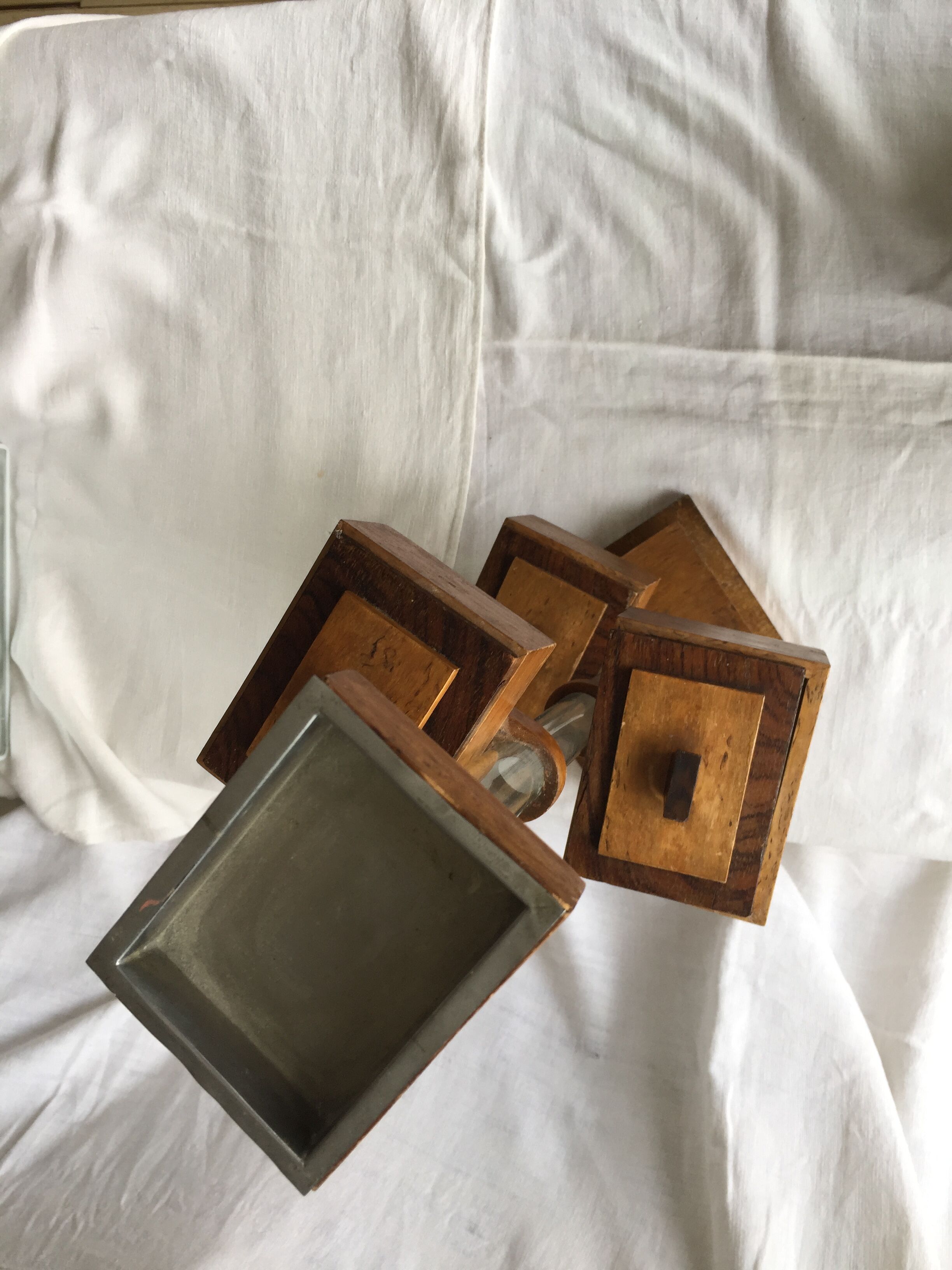 Small 1930s wooden and glass furniture with sliding storage boxes