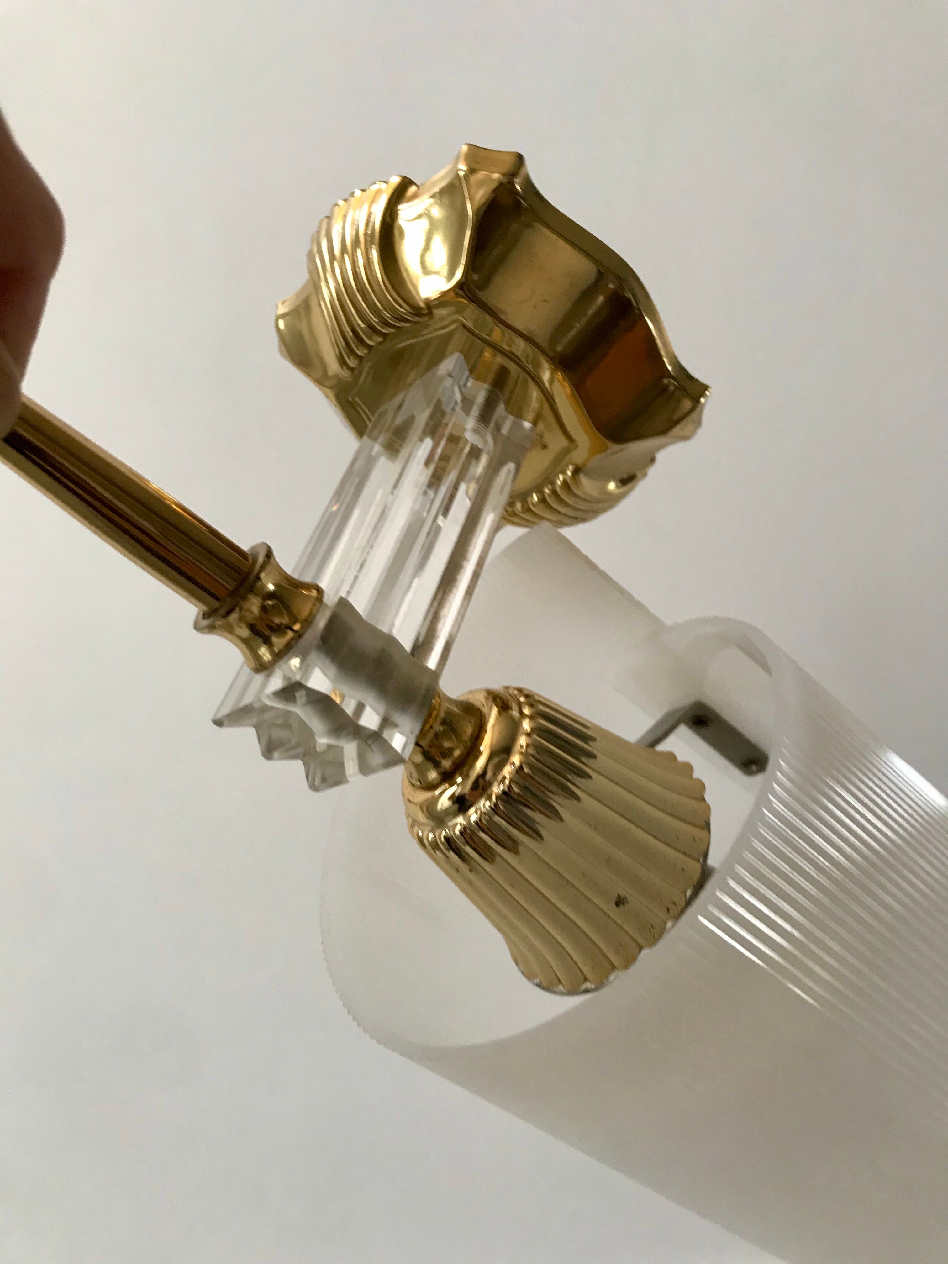 Pair of gold steel wall lamps, plexi and pleated plastic shades 60s-70s