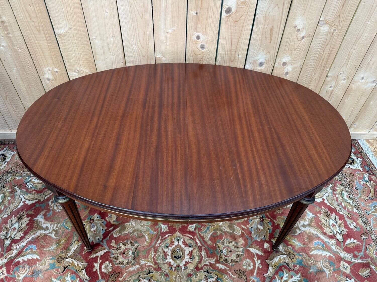 Oval dining table in Louis XVI style