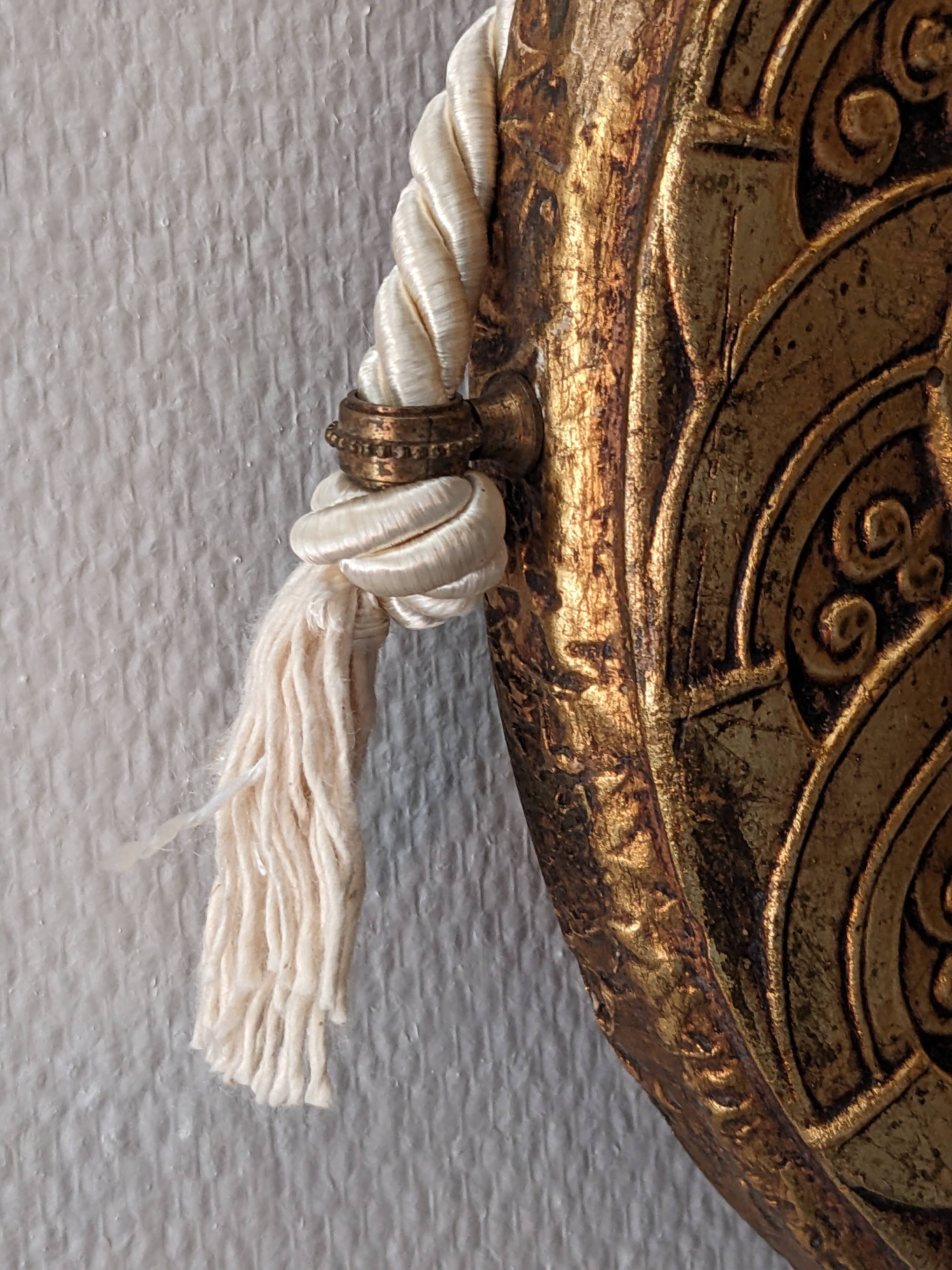 Art Deco oval mirror in gilded wood, France circa 1920