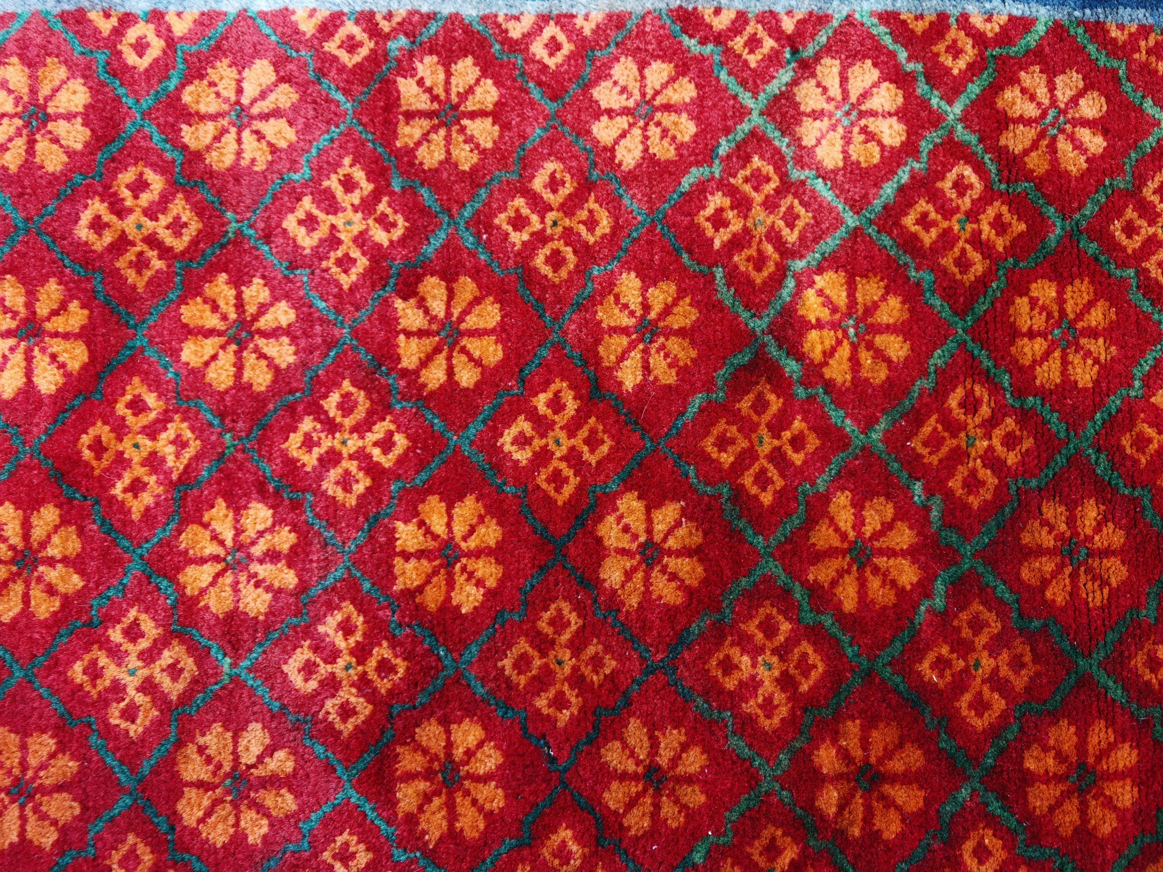 Ancient Khotan carpet, hand-knotted, floral pattern, Turkestan, 1960s.