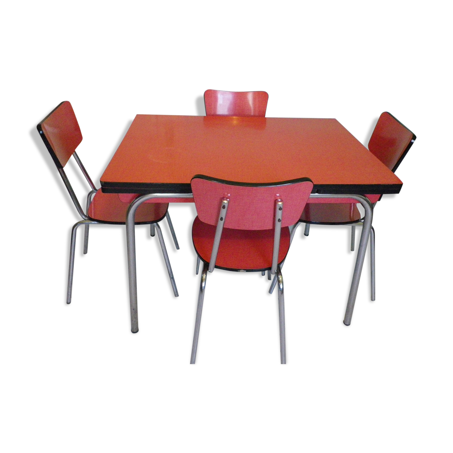 Table in red formica, 4 roc chairs, 2 extension cords, 2 drawers 60