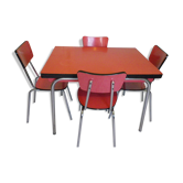 Table in red formica, 4 roc chairs, 2 extension cords, 2 drawers 60