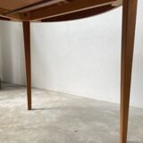 Scandinavian round teak table with extension