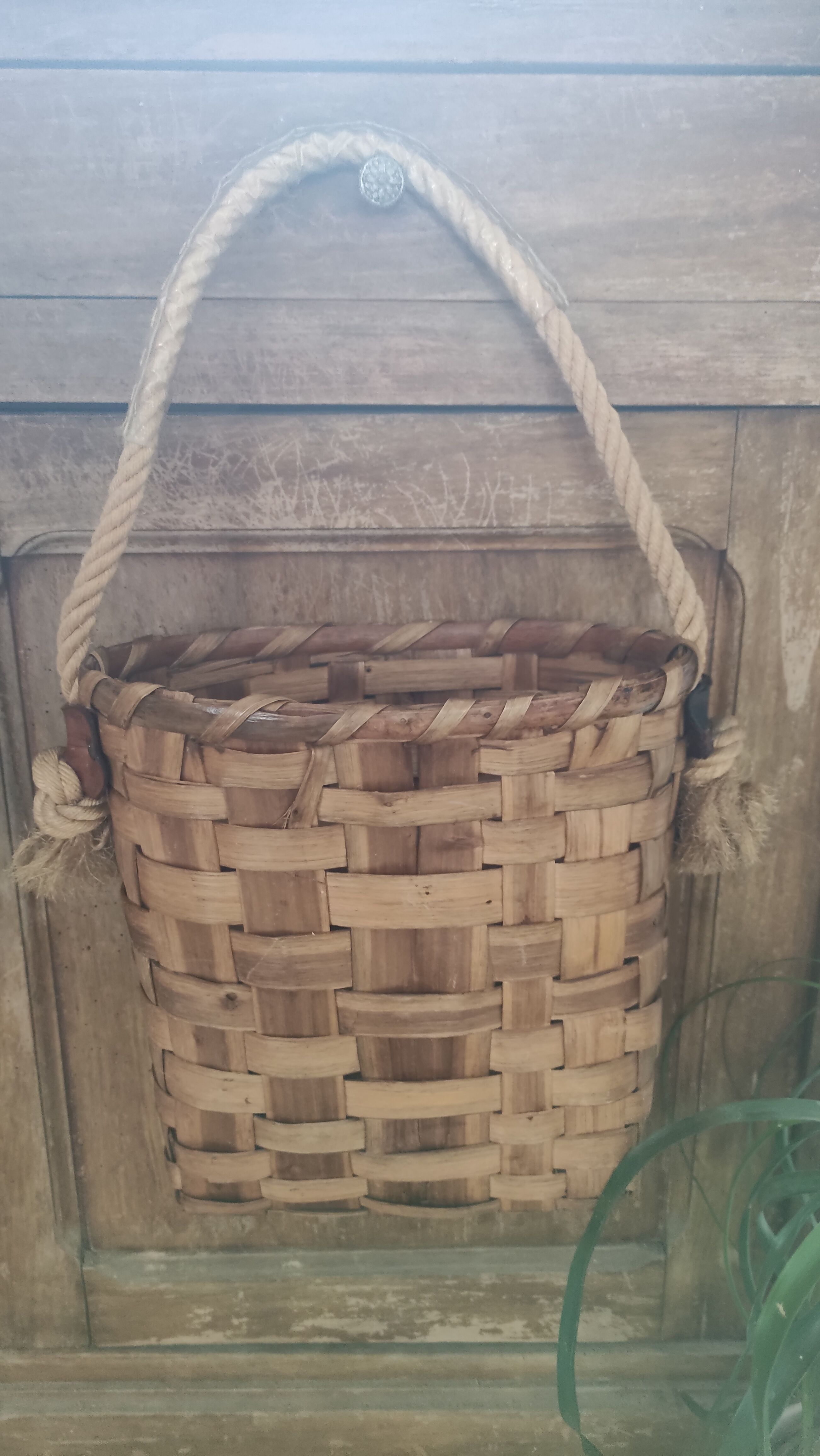 Basket or bag to put or hang leather, rope, brass and rattan