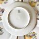 12 Assiettes à dessert en porcelaine de Limoges