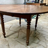 Round oak table with shutters