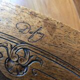 Table and 6 chairs, signed Dufin Honoré