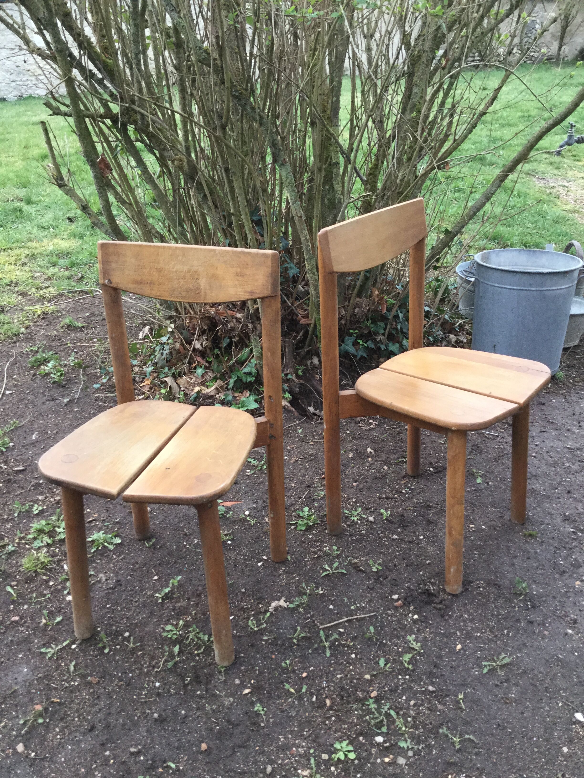 A pair of Chair grain of Café Pierre Gautier - Delaye