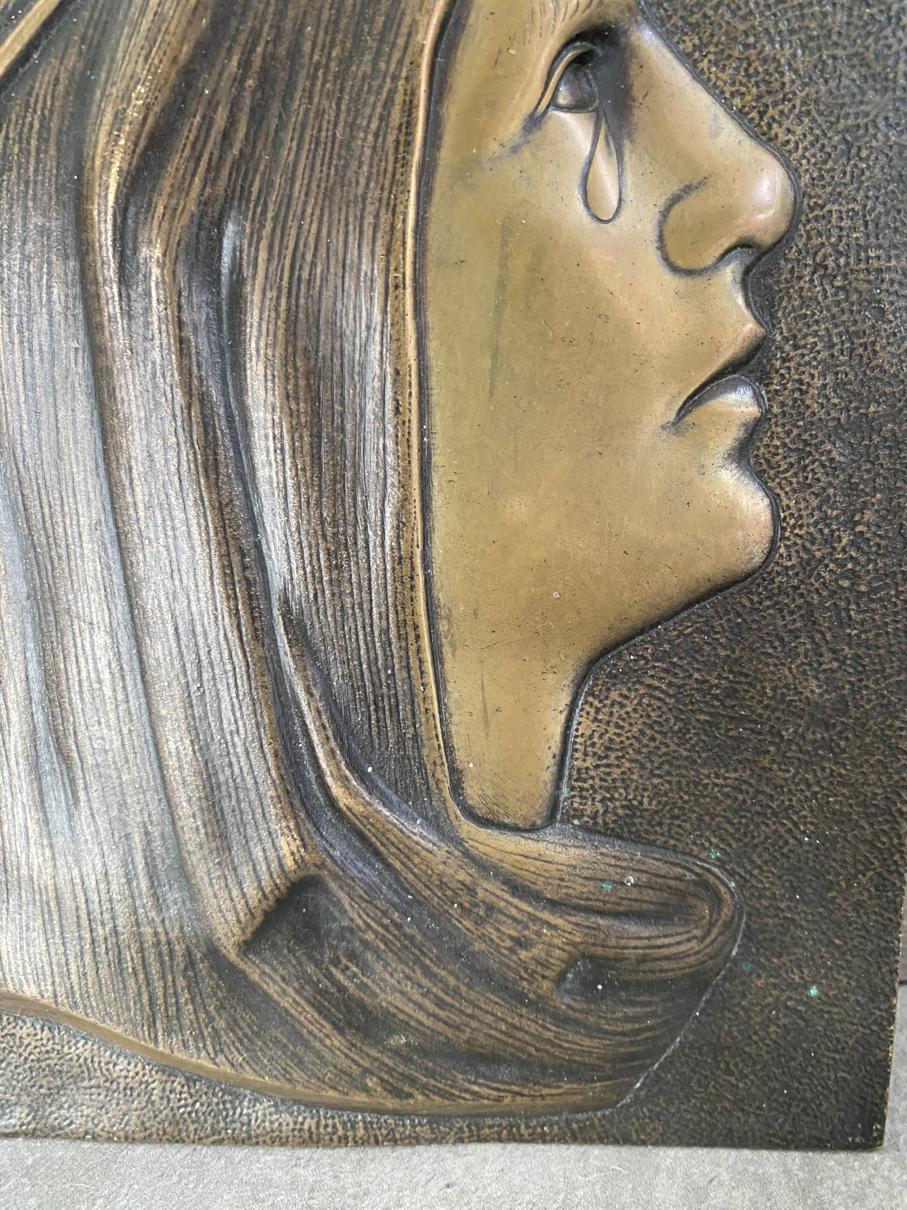 Bronze bas-relief of the Virgin