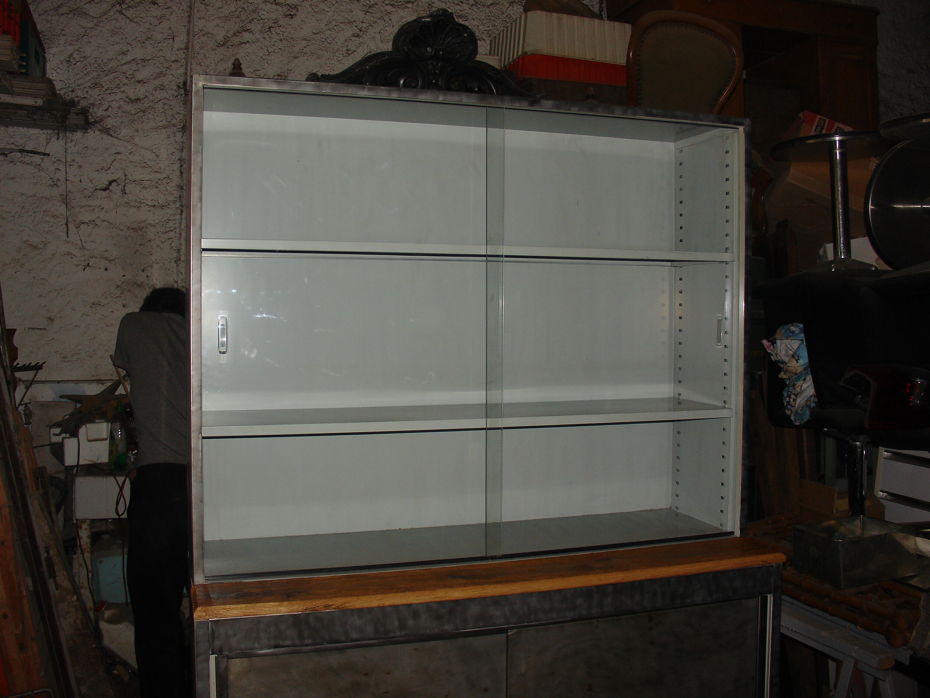 Buffet or Bookcase 2 bodies in polished and varnished steel circa 1960