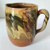 Glazed earthenware jug