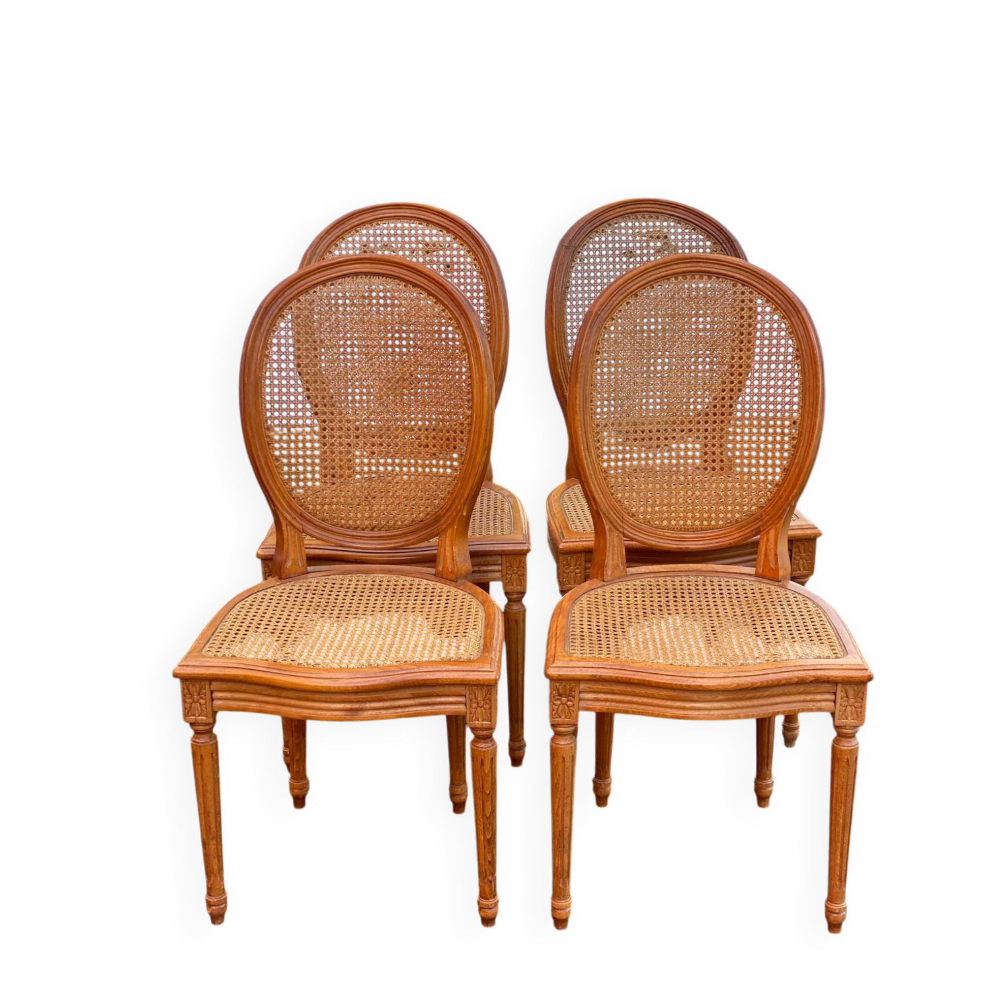 4 caned Louis XVI medallion dining chairs from the 19th century.