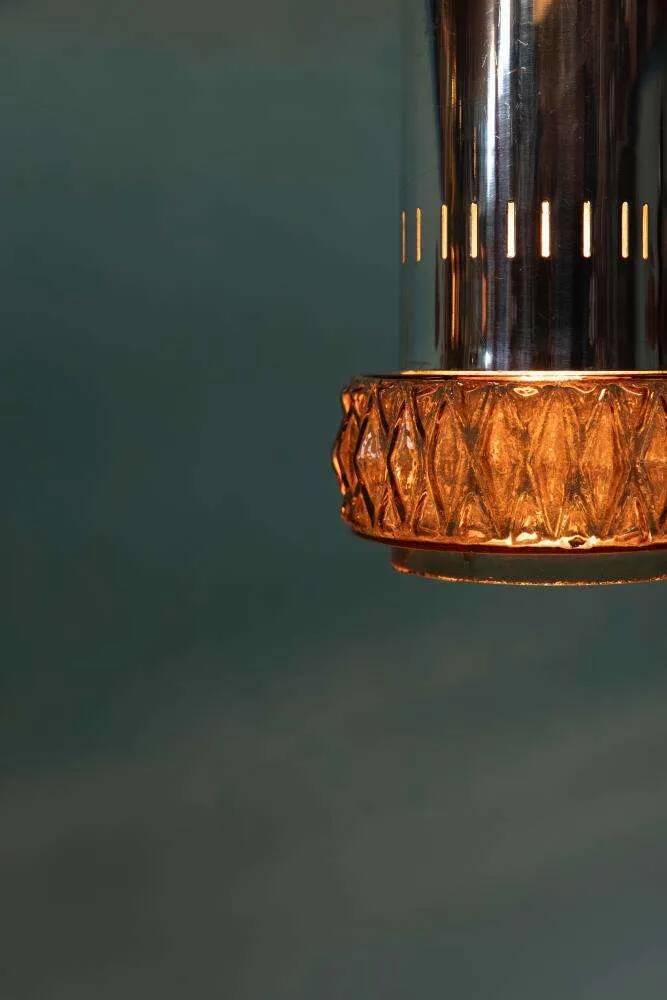 Suspended glass from the space age, mid-century glass from the 1960s.