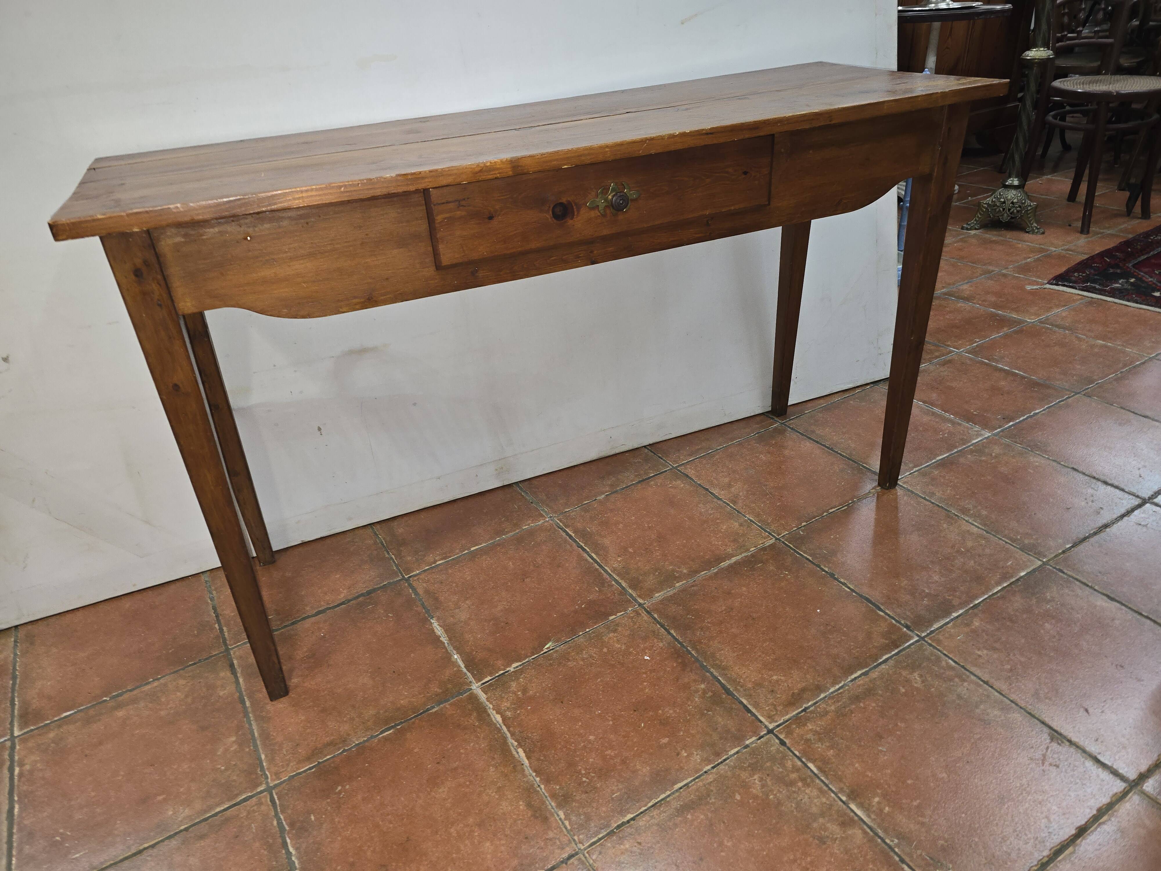 Old console table with spindle legs