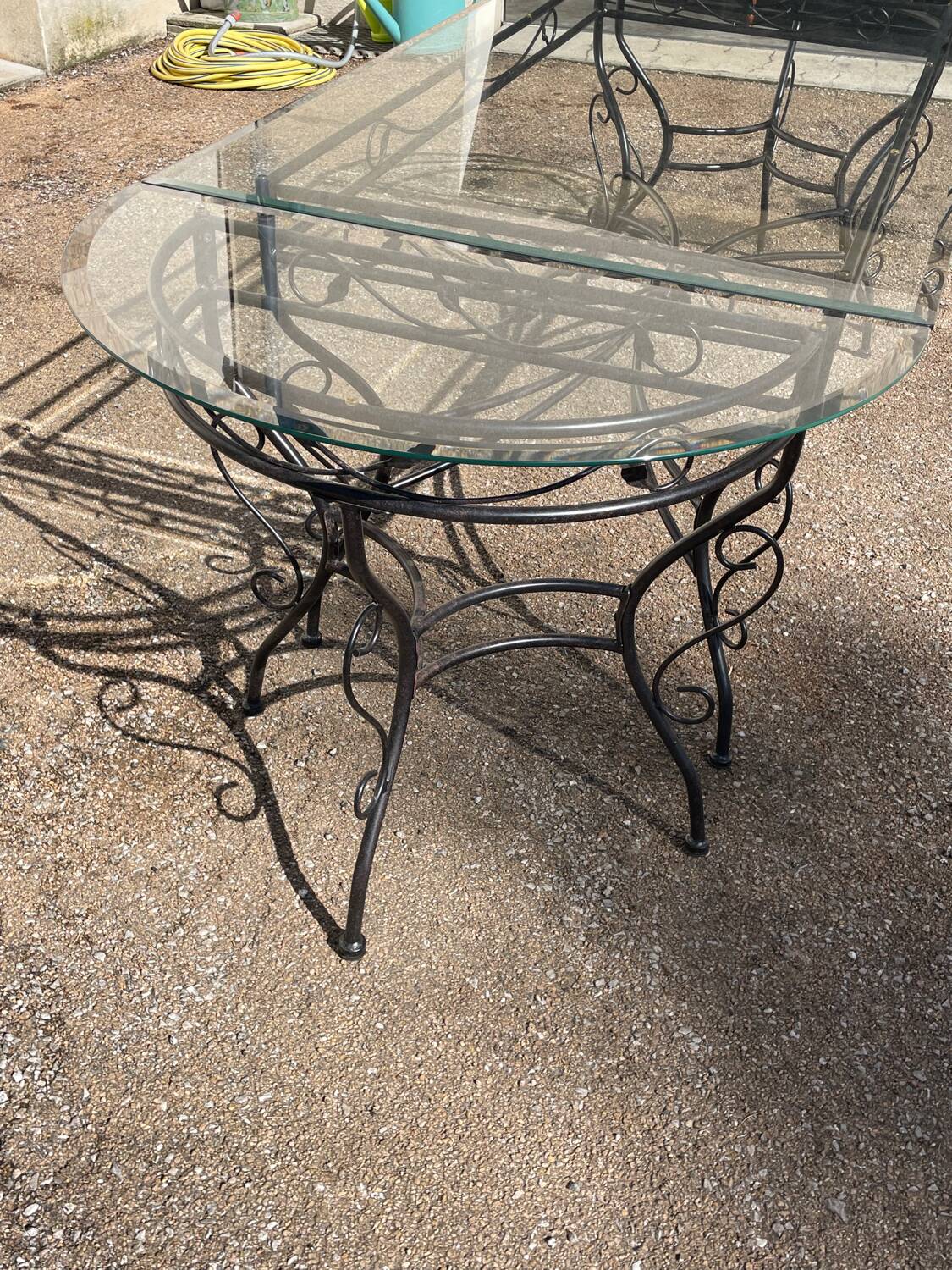 Glass and iron table with two side tables and 8 chairs