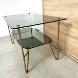 1975 glass coffee table with 2 tops, good condition