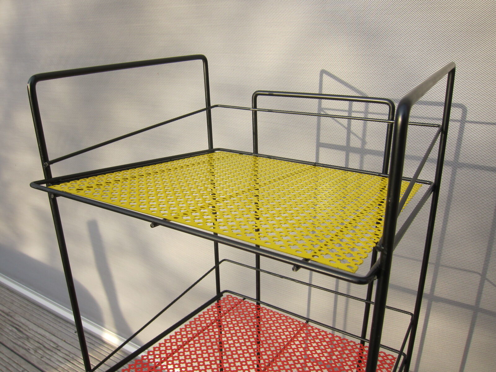 Display red and yellow perforated metal 1960