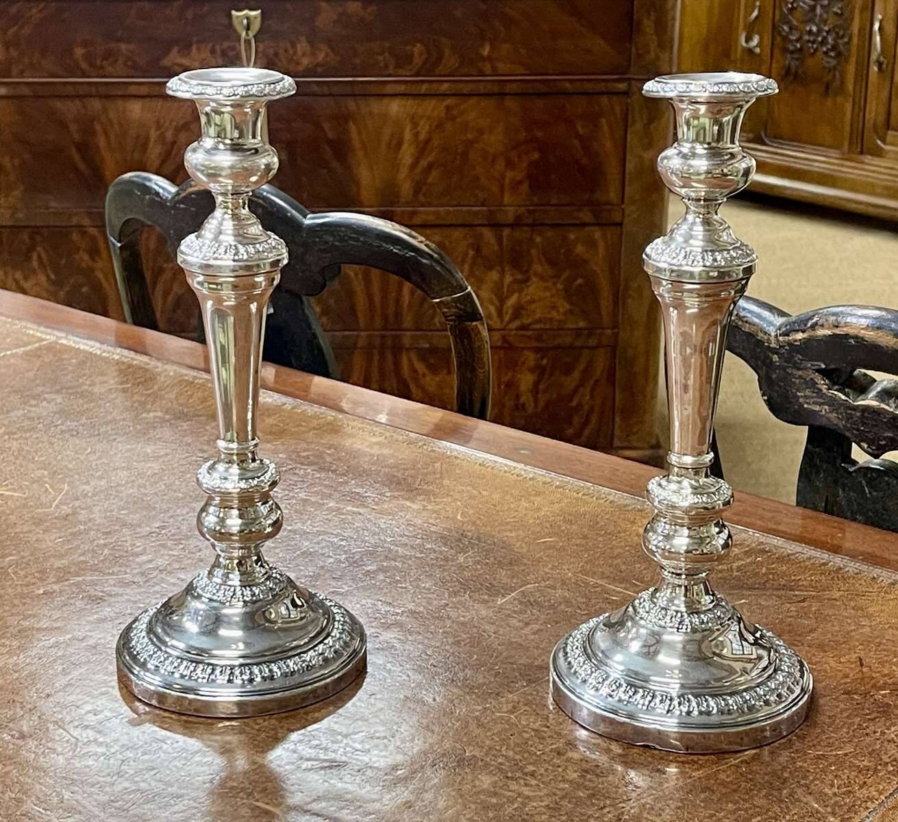 Pair of silver-plated metal candlesticks from the early 20th century